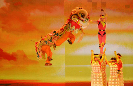 Lion dancers perform during the Grand Variety Show in Hong Kong June 30, 2007. The show is part of a series of events celebrating the 10th anniversary of Hong Kong's handover to China.