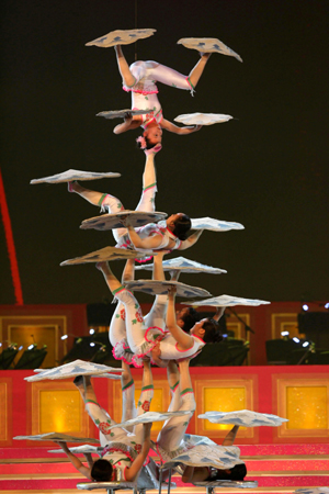 Acrobats perform during the Grand Variety Show in Hong Kong June 30, 2007. The show is part of a series of events celebrating the 10th anniversary of Hong Kong's handover to China. 
