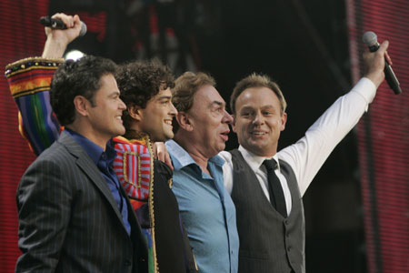 (L-R) Donny Osmond, Lee Mead, Andrew Lloyd-Webber and Jason Donovan wave to the crowd following their performance at the Concert for Diana at Wembley Stadium in London July 1, 2007. An international lineup of pop stars paid tribute to Princess Diana on Sunday at a memorial concert watched by her sons Princes William and Harry and a crowd of 60,000 at London's Wembley Stadium.