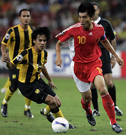 国足5比1痛宰马来西亚 取亚洲杯开门红-英语点
