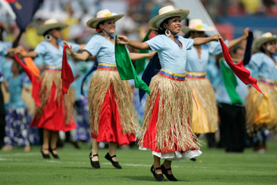 Venezuelan dancers perform before the start of the Copa America soccer final between Argentina and Brazil in Maracaibo July 15, 2007.