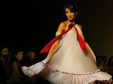 A model presents the creation of designer Surily Goel at the Lakme Fashion Week in Mumbai, India, Wednesday, Nov 1, 2006.