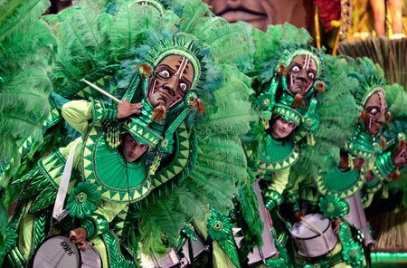 Members of Kamarr carnival group perform during the annual El Carnaval del Pais (country's carnival) in Gualeguaychu, some 230 km (143 miles) north of Buenos Aires, January 6 , 2007. 