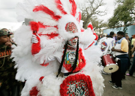 A member of the Wild Magnolia Mardi Gras Indians sings in New Orleans, Louisiana February 20, 2007.