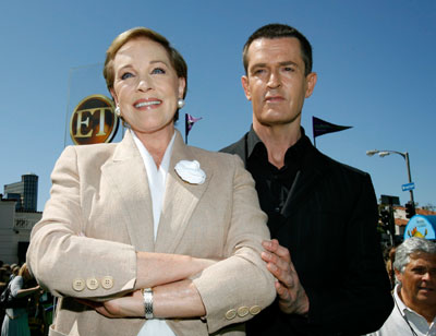 Cast member Julie Andrews (L) poses with co-star Rupert Everett at the premiere of 