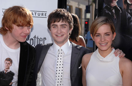 Cast members Rupert Grint (L-R), Daniel Radcliffe and Emma Watson attend the premiere of 