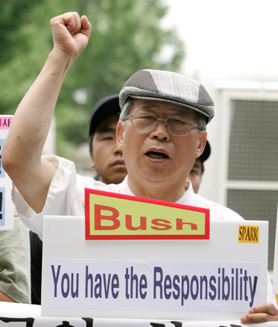 A man shouts slogans during an anti-war and anti-U.S. rally demanding negotiations between the U.S. government and the Taliban for the safe return of South Korean hostages in Afghanistan, in front of the U.S. embassy in Seoul August 1, 2007.