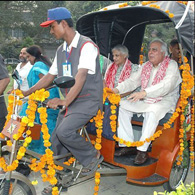 A cycle rickshaw with help from the sun
