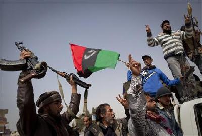 Libyan rebels retake Ajdabiya as unrest continues across Middle East
