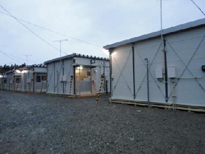 First of Japan disaster survivors get temporary houses