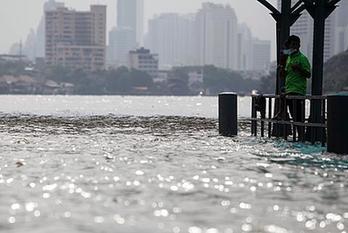 Asia floods take heavy toll on local economies