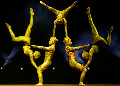 Members of the Zunyi Acrobatic Troupe from the Chinese National Acrobatic Circus perform during a show in Roquetas de Mar, southeast Spain, late August 12, 2007.