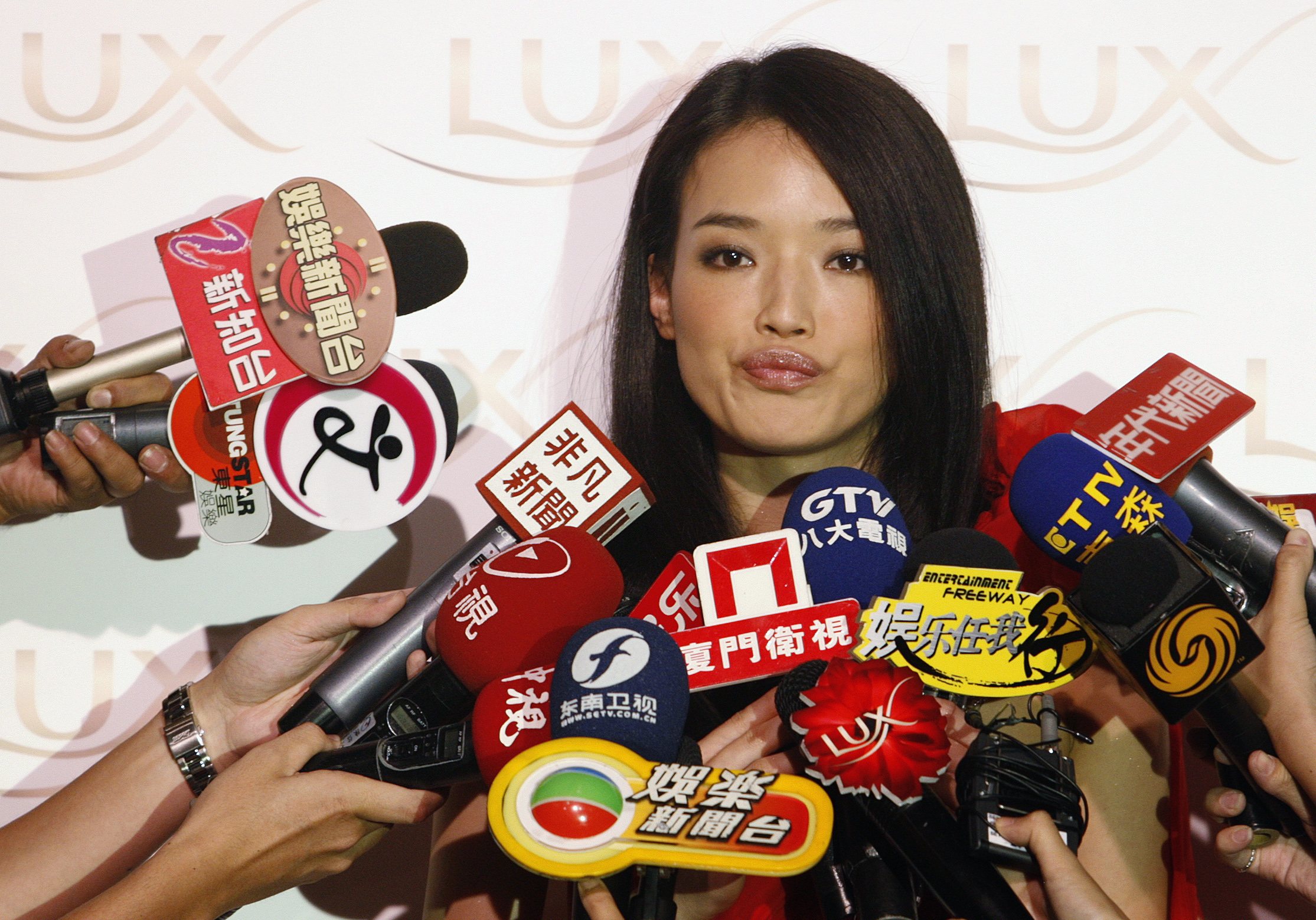 Shu Qi promotes new Lux products