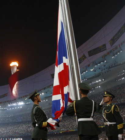 Beijing passes Olympic host baton to London