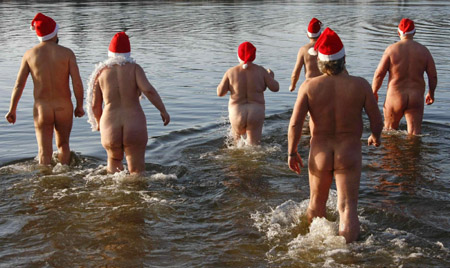 Santas go for ice swimming