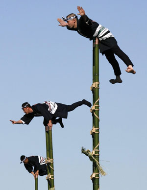 Japanese firefighters show off pole dancing skills