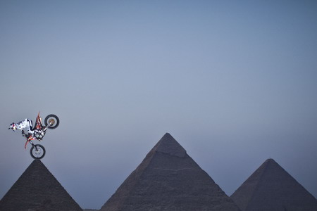 Bikers show stunt skills at Giza pyramids