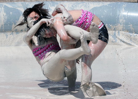 Mud and guts in women's mud wrestling contest