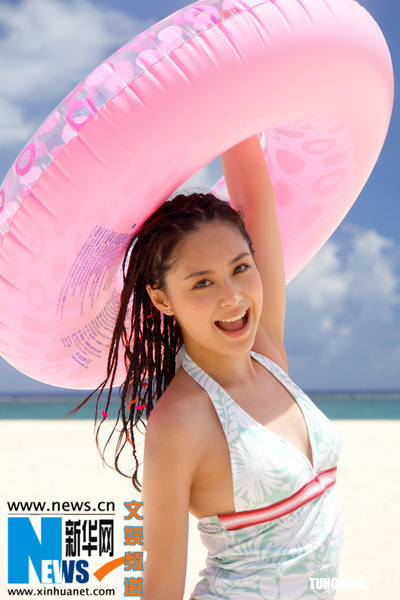 Gillian Chung poses in bikini when shooting the music videos and cover photo for their latest Cantonese album "Ho Hoo Tan" on Saipan Island, United States. 