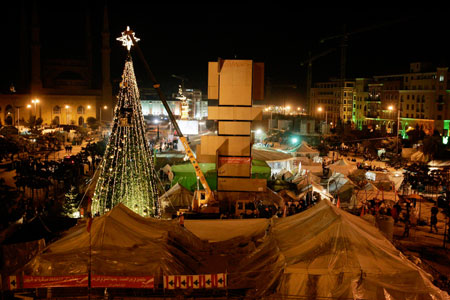 Lebanese Christian protesters decorate a Christmas tree at an anti-government protest in central Beirut December 18, 2006.