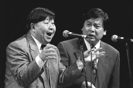 Ma Ji, left, performs with his student Zhao Yan in the U.S.,1994.