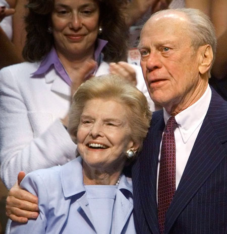 Former U.S. President Gerald Ford stands with his wife Bette at the Republican National Convention in this August 1, 2000 file photo. Ford, who was swept into office after the Watergate scandal and later pardoned Richard Nixon, died at age 93, according to a statement from his widow on December 26, 2006.