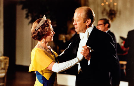 Former U.S. President Gerald Ford (R) and Britain's Queen Elizabeth dance during a state dinner in honor of the Queen and Prince Philip at the White House in this July 17, 1976 file photo. Ford died December 26, 2006 at the age of 93.