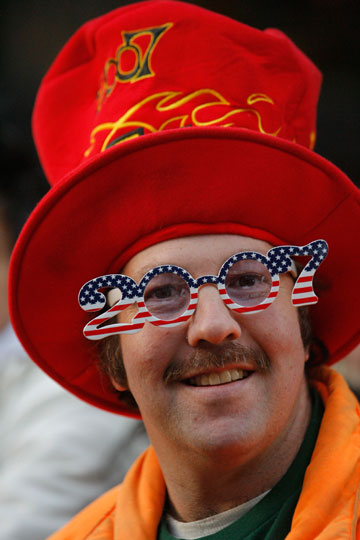 A man wears celebratory gear as revelers begin to gather at Times Square in the afternoon as part of New Year's Eve celebrations in New York December 31, 2006.