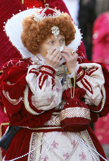 A woman dressed as Britain's 16th century Queen Elizabeth I participates in the 21st New Year's Day Parade in central London January 1, 2007. Thousands of people watched the parade comprising of over ten thousand performers from all over the world as it made its way through the city from Parliament Square to Piccadilly.
