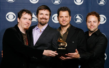 Members of Third Day, Mark Lee, Mac Powell, Tai Anderson and David Carr (L-R), hold the award for Best Pop/Contemporary Gospel Album, for 