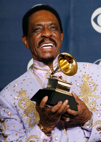 Ike Turner poses with his Grammy for Best Traditional Blues Album for 'Risin With the Blues' at the 49th Annual Grammy Awards in Los Angeles February 11, 2007.
