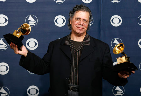 Chick Corea poses with his Grammys for Best Instrumental Arrangement for 