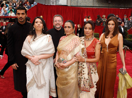 (L-R) Actor John Abraham, an unidentified woman, producer David Hamilton, director Deepa Mehta, actress Seema Biswas and actress Lisa Ray from Best Foreign Language Film nominee 'Water' arrive at the 79th Annual Academy Awards in Hollywood, California, February 25, 2007. (Reuters)