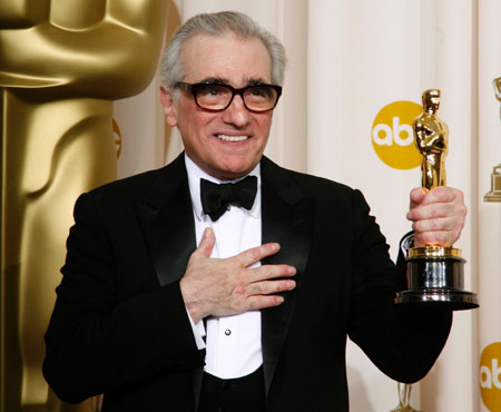 Martin Scorsese poses with the Oscar for Best Director for 