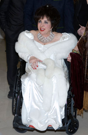 Actress Elizabeth Taylor arrives for her 75th birthday party at the Ritz-Carlton in Lake Las Vegas, in Henderson, Nevada February 27, 2007.