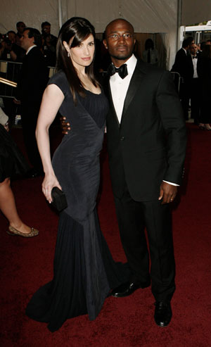 Idina Menzel and Taye Diggs (R) arrive to attend the Metropolitan Museum of Art Costume Institute Benefit Gala 