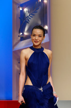 Actress Shu Qi arrives on stage for the opening ceremony of the 60th Cannes Film Festival May 16, 2007.