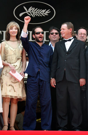 Mexican director Carlos Reygadas (C) arrives with cast members Maria Pankratz (L) and Cornelio Wall for a gala screening of the director's film 