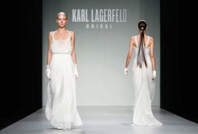 Models present creations from Karl Largerfeld Bridal collection at Barcelona Bridal Week fashion show May 29, 2007.