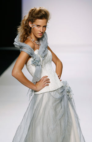 A model presents a creation from the Ruben Perlotti collection at the Barcelona Bridal Week fashion show May 31, 2007.