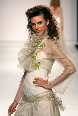 A model presents a creation from the Ruben Perlotti collection at the Barcelona Bridal Week fashion show May 31, 2007.