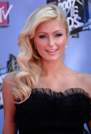Paris Hilton attends the 2007 MTV Movie Awards in Los Angeles, California June 3, 2007. Hilton has begun serving her Los Angeles jail sentence for violating probation, her attorney said on Sunday. Richard A. Hutton said in a statement that the 26-year-old socialite turned herself in to authorities at a Los Angeles County Jail in the suburb of Lynwood.