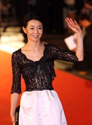 Actress Maggie Cheung walks on the red carpet in Shanghai Grand Theater on Saturday night, June 16, 2007, before the opening ceremony of the 10th Shanghai International Film Festival.