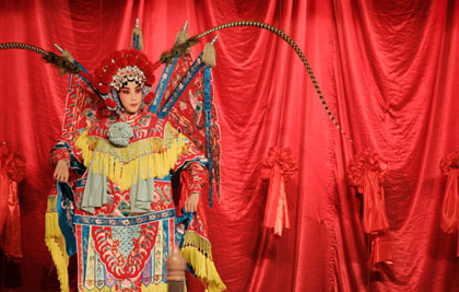 A Beijing opera actress performs before a news conference for Chinese director Chen Kaige's production of Mei Lanfang in Beijing July 19, 2007. Veteran director Chen Kaige, best known in the West for 