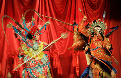 Beijing opera actors perform before a news conference for Chinese director Chen Kaige's production of Mei Lanfang in Beijing July 19, 2007. Veteran director Chen Kaige, best known in the West for 