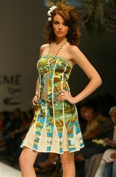 A model presents the creation of designer Vikram Phadnis at Lakme Fashion Week in Mumbai, India, Tuesday, Oct. 31, 2006.