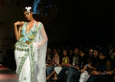 A model presents a creation by designer Vikram Phadnis at the Lakme Fashion Week in Mumbai, India, Tuesday, Oct. 31, 2006.
