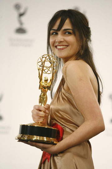 Dutch actress Maryam Hassouni holds up her Emmy award for best performance by an actress as she poses for photographers at the International Emmy Awards in New York, November 20, 2006.