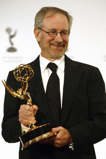 American film director Stephen Spielberg holds up his Founders Emmy award at the International Emmy Awards in New York, November 20, 2006.