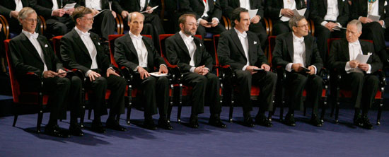 The 2006 Nobel Prize laureates (L-R) John Mather, George Smoot III, Roger Kornberg, Andrew Fire, Craig Mello, Orhan Pamuk and Edmund Phelps attend the awards ceremony at the Concert Hall in Stockholm December 10, 2006. The Nobel Prize is the first international award given yearly since 1901 for achievements in physics, chemistry, physiology or medicine, literature and peace. In 1968, the Sveriges Riksbank (Bank of Sweden) instituted the Prize in Economic Sciences in memory of Alfred Nobel, founder of the Nobel Prize. Each prize consists of a medal, personal diploma, and prize amount.